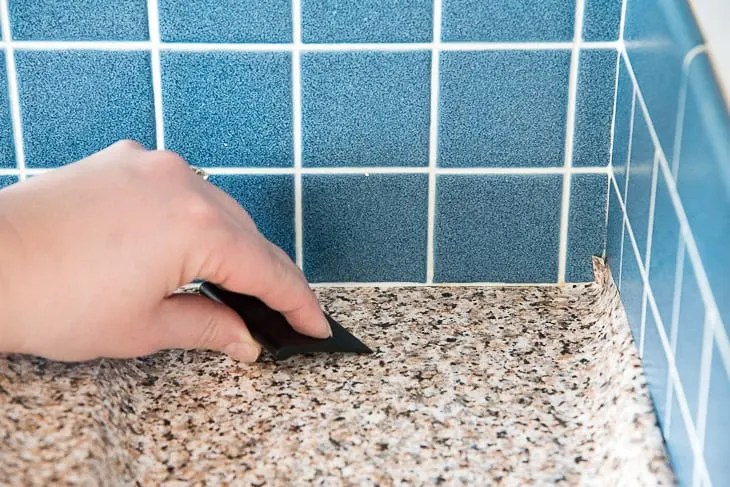 smoothing out air bubbles when applying countertop contact paper