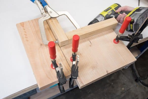 boards clamped at a right angle to prevent shifting of boards with pocket holes